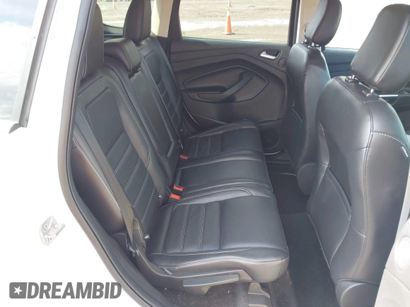 2019 Ford Escape Titanium with VIN 1FMCU9J98KUA95238, listed as a IAAI auction lot 42525324 with 59,222 mi miles and . Bid and sale history available at DreamBid. Image 8.
