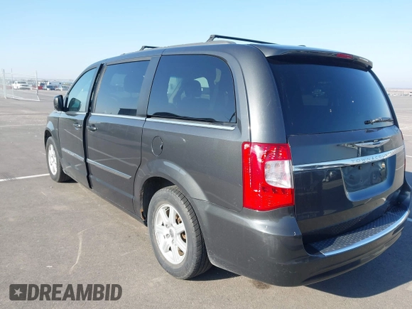 2011 Chrysler Town & Country Touring with VIN 2A4RR5DG6BR782499, listed as a IAAI auction lot 42063944 with 165,647 mi miles and . Bid and sale history available at DreamBid. Image 3.