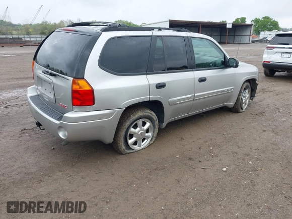 2005 GMC Envoy SLE z VIN 1GKDT13S752159660, wystawiony jako IAAI lot #41996041 z przebiegiem 133 948 mil mil oraz . Historia ofert i sprzedaży dostępna na DreamBid. Obrazek 4.