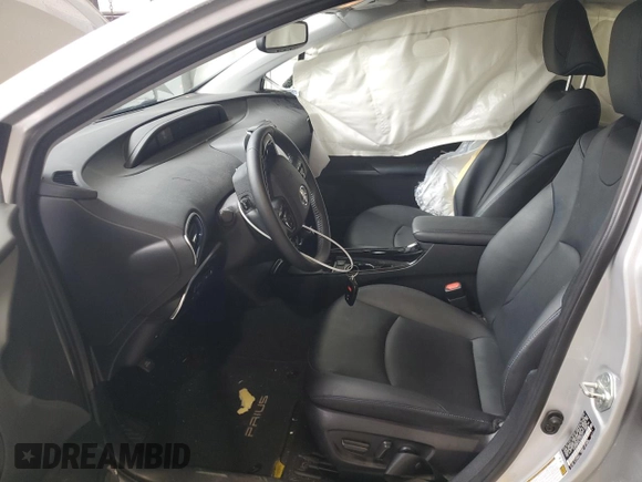 2020 Toyota Prius L Eco с VIN JTDKARFU2L3120017, выставлен на аукционе Copart как лот 64256835 с пробегом 25 278 миль миль и Списание • Salvage title. История ставок и продаж доступна на DreamBid. Изображение 7.