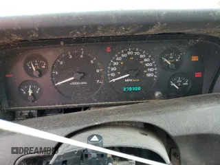 1999 Jeep Grand Cherokee Limited with VIN 1J4G268S2XC756532, listed as a Copart auction lot 71222174 with 279,300 mi miles and Salvage title. Bid and sale history available at DreamBid. Image 9.