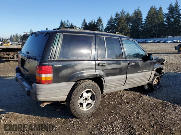 1998 Jeep Grand Cherokee Laredo with VIN 1J4GZ58S0WC106148, listed as a Copart auction lot 42855105 with 263,785 mi miles and Salvage Title. Bid and sale history available at carsss.com. Image 3.