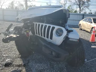2021 Jeep Gladiator Freedom z VIN 1C6HJTAGXML557586, wystawiony jako Copart lot #43510795 z przebiegiem Nie podano mil oraz Szkoda całkowita • Salvage title. Historia ofert i sprzedaży dostępna na DreamBid. Obrazek 5.