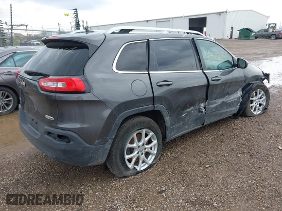 2014 Jeep Cherokee Altitude with VIN 1C4PJMCB2EW181848, listed as a IAAI auction lot 41638004 with 175,813 mi miles. Bid and sale history available at carsss.com. Image 4.