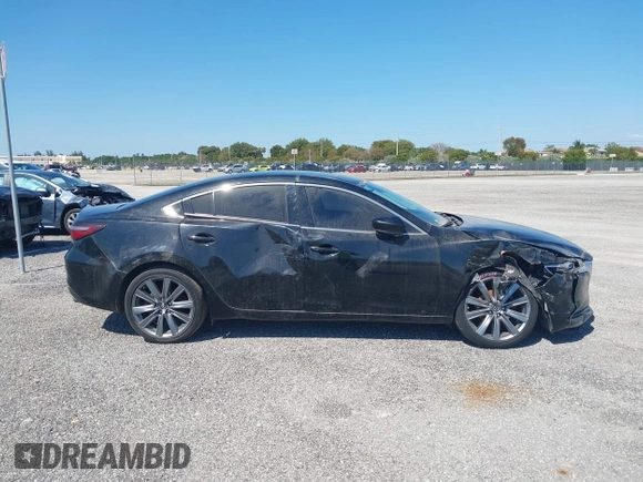 2020 Mazda 6 Touring with VIN JM1GL1VMXL1517828, listed as a IAAI auction lot 41511804 with 123,174 mi miles. Bid and sale history available at carsss.com. Image 13.
