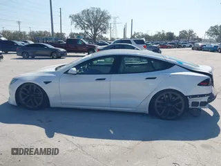 2022 Tesla Model S Plaid with VIN 5YJSA1E64NF484904, listed as a IAAI auction lot 41594464 with 25,299 mi miles and . Bid and sale history available at DreamBid. Image 13.