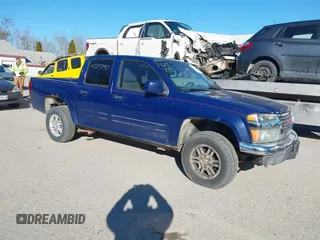 2011 GMC Canyon SLE1 with VIN 1GTH6MFE3B8123808, listed as a IAAI auction lot 41297090 with 142,877 mi miles. Bid and sale history available at carsss.com. Image 1.