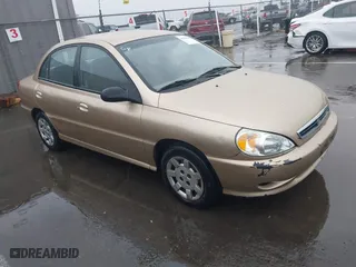 2002 Kia Rio with VIN KNADC123626192611, listed as a IAAI auction lot 41765104 with 62,387 mi miles. Bid and sale history available at carsss.com. Image 1.