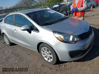 2015 Kia Rio LX with VIN KNADM4A3XF6483635, listed as a IAAI auction lot 41897270 with 136,981 mi miles. Bid and sale history available at carsss.com. Image 1.