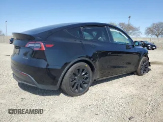 2023 Tesla Model Y Long Range with VIN 7SAYGAEE0PF642810, listed as a Copart auction lot 52181655 with 74,922 mi miles and Salvage Title. Bid and sale history available at DreamBid. Image 3.