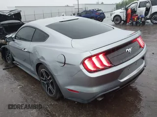 2020 Ford Mustang EcoBoost with VIN 1FA6P8TH3L5111659, listed as a IAAI auction lot 42115879 with 93,928 mi miles and . Bid and sale history available at DreamBid. Image 3.