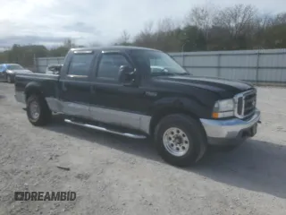 2002 Ford F-250 XL with VIN 3FTNW20F72MA07306, listed as a Copart auction lot 80054914 with 182,808 mi miles and Salvage Title. Bid and sale history available at DreamBid. Image 4.