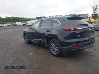 2020 Mazda CX-9 Touring with VIN JM3TCBCY5L0422262, listed as a IAAI auction lot 42456246 with 69,211 mi miles and . Bid and sale history available at DreamBid. Image 3.