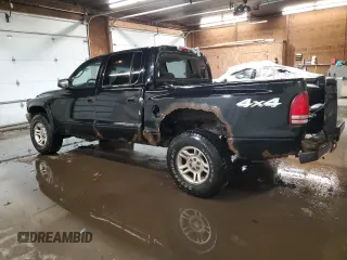 2004 Dodge Dakota Sport z VIN 1D7HG38KX4S782636, wystawiony jako Copart lot #88805195 z przebiegiem 151 620 mil mil oraz Szkoda całkowita • Salvage title. Historia ofert i sprzedaży dostępna na DreamBid. Obrazek 2.
