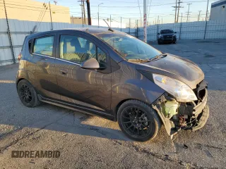 2014 Chevrolet Spark EV LT with VIN KL8CL6S09EC413313, listed as a Copart auction lot 85750614 with 50,618 mi miles and Salvage Title. Bid and sale history available at carsss.com. Image 4.