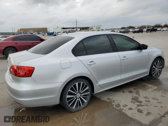 2014 Volkswagen Jetta Sedan S with VIN 3VW2K7AJ0EM311044, listed as a Copart auction lot 85212324 with 128,521 mi miles and Salvage Title. Bid and sale history available at carsss.com. Image 3.