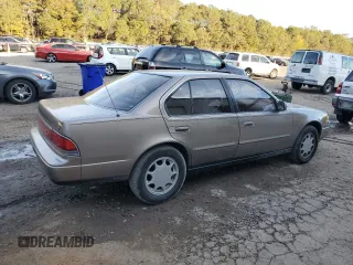 1990 Nissan Maxima z VIN JN1HJ01P3LT393901, wystawiony jako Copart lot #79912694 z przebiegiem 127 678 mil mil oraz Szkody całkowita. Historia ofert i sprzedaży dostępna na DreamBid. Obrazek 3.