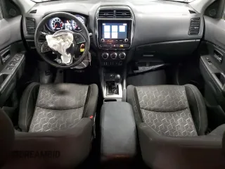 2021 Mitsubishi Outlander Sport SE with VIN JA4AJVAW2MU606670, listed as a Copart auction lot 43727945 with 96,730 mi miles and Salvage title. Bid and sale history available at DreamBid. Image 8.