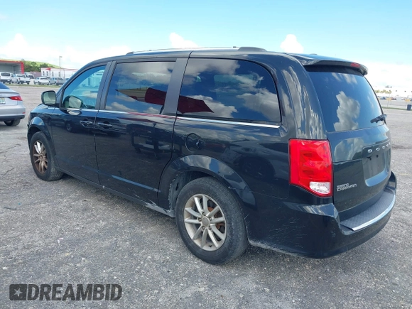 2019 Dodge Grand Caravan SXT with VIN 2C4RDGCG5KR797853, listed as a IAAI auction lot 40332854 with 81,197 mi miles and . Bid and sale history available at DreamBid. Image 3.