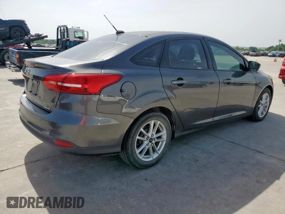 2015 Ford Focus SE with VIN 1FADP3F27FL313650, listed as a Copart auction lot 57183745 with 95,413 mi miles and Clean title. Bid and sale history available at DreamBid. Image 3.