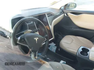 2014 Tesla Model S 60 z VIN 5YJSA1H19EFP51406, wystawiony jako IAAI lot #41561395 z przebiegiem Nie podano mil oraz . Historia ofert i sprzedaży dostępna na DreamBid. Obrazek 18.