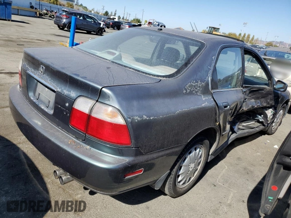 1997 Honda Accord EX with VIN 1HGCD5668VA113949, listed as a Copart auction lot 72819714 with 250,206 mi miles and Salvage Title. Bid and sale history available at DreamBid. Image 3.