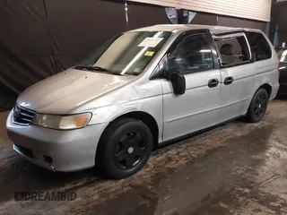 2002 Honda Odyssey LX z VIN 2HKRL18532H573727, wystawiony jako IAAI lot #42266783 z przebiegiem 127 491 mil mil oraz . Historia ofert i sprzedaży dostępna na DreamBid. Obrazek 2.