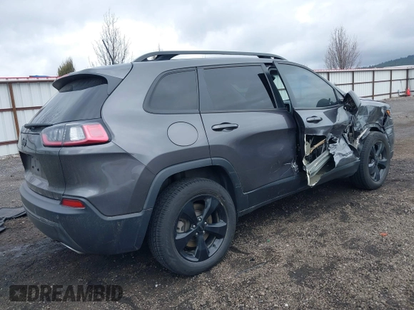 2020 Jeep Cherokee Altitude with VIN 1C4PJMLN0LD529679, listed as a IAAI auction lot 41824288 with 96,564 mi miles. Bid and sale history available at carsss.com. Image 4.