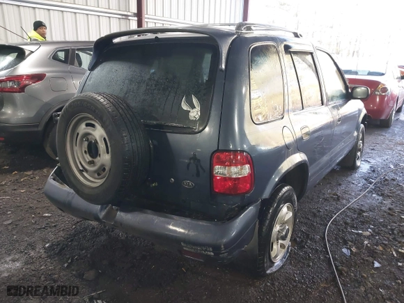 2002 Kia Sportage with VIN KNDJB723X25134499, listed as a IAAI auction lot 41273605 with 1 mi miles. Bid and sale history available at carsss.com. Image 4.