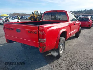 1999 Dodge Dakota SLT with VIN 1B7GG22XXXS290116, listed as a IAAI auction lot 41372636 with 132,112 mi miles and . Bid and sale history available at carsss.com. Image 4.