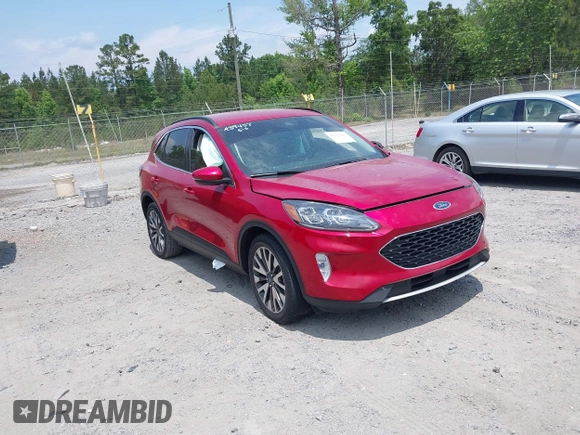2020 Ford Escape Titanium z VIN 1FMCU9J92LUA39457, wystawiony jako IAAI lot #42222441 z przebiegiem 107 148 mil mil oraz . Historia ofert i sprzedaży dostępna na DreamBid. Obrazek 1.