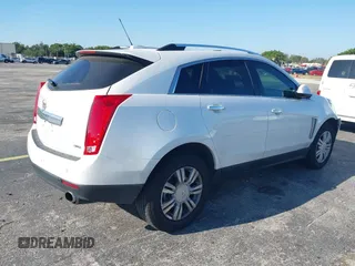 2016 Cadillac SRX Luxury Collection with VIN 3GYFNBE39GS548327, listed as a IAAI auction lot 41889611 with 140,670 mi miles. Bid and sale history available at carsss.com. Image 4.