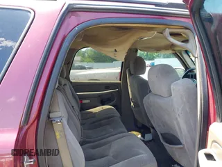 2004 Chevrolet Tahoe LT z VIN 1GNEC13Z44J281353, wystawiony jako IAAI lot #42317558 z przebiegiem 373 908 mil mil oraz . Historia ofert i sprzedaży dostępna na DreamBid. Obrazek 8.