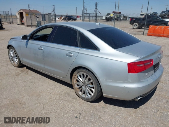 2013 Audi A6 Premium Plus with VIN WAUDFAFCXDN051423, listed as a IAAI auction lot 42249789 with 124,372 mi miles and . Bid and sale history available at DreamBid. Image 3.