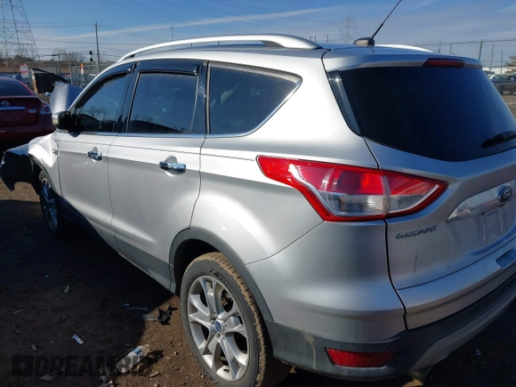 2015 Ford Escape Titanium with VIN 1FMCU0J93FUC02844, listed as a IAAI auction lot 41531293 with 115,392 mi miles and . Bid and sale history available at DreamBid. Image 3.