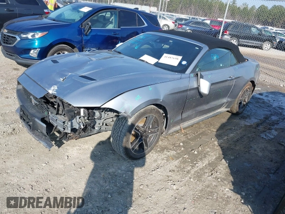 2022 Ford Mustang EcoBoost with VIN 1FATP8UH7N5105674, listed as a IAAI auction lot 41487698 with 64,043 mi miles. Bid and sale history available at carsss.com. Image 2.
