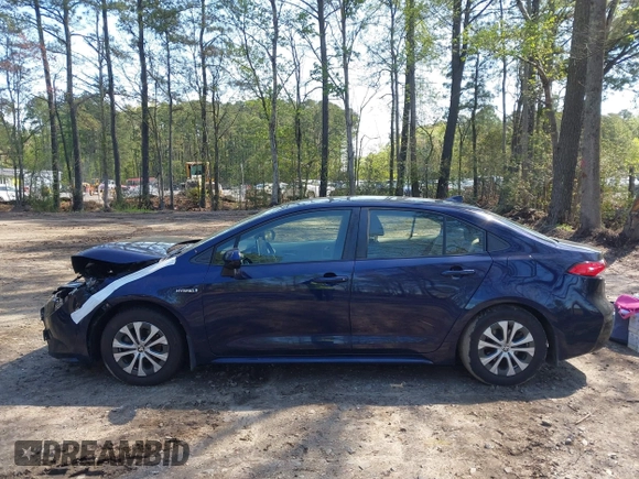 2021 Toyota Corolla Hybrid LE with VIN JTDEAMDE9MJ008582, listed as a IAAI auction lot 41998098 with 113,863 mi miles. Bid and sale history available at carsss.com. Image 13.