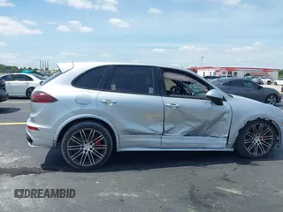 2016 Porsche Cayenne GTS z VIN WP1AD2A27GLA76018, wystawiony jako IAAI lot #42209515 z przebiegiem 49 432 mil mil oraz . Historia ofert i sprzedaży dostępna na DreamBid. Obrazek 6.