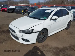 2015 Mitsubishi Lancer SE with VIN JA32V2FW9FU025402, listed as a IAAI auction lot 41646407 with 67,201 mi miles. Bid and sale history available at carsss.com. Image 18.