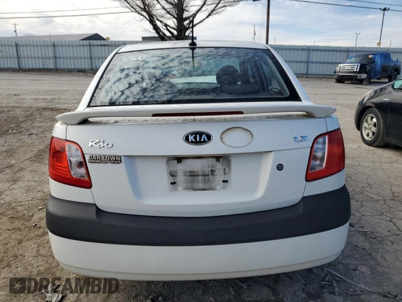 2009 Kia Rio LX with VIN KNADE223396477003, listed as a Copart auction lot 44943675 with 174,791 mi miles and Salvage Title. Bid and sale history available at carsss.com. Image 6.