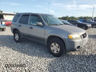 2007 Ford Escape XLS with VIN 1FMYU02Z77KA28665, listed as a Copart auction lot 64358445 with 67,350 mi miles and Clean title. Bid and sale history available at DreamBid. Image 4.