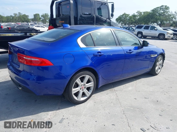 2018 Jaguar XE 25t Premium with VIN SAJAD4FX7JCP24113, listed as a IAAI auction lot 41984954 with 91,318 mi miles. Bid and sale history available at carsss.com. Image 4.
