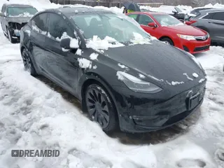 2023 Tesla Model Y Performance with VIN 7SAYGDEF4PF797192, listed as a IAAI auction lot 41550259 with 13,312 mi miles and . Bid and sale history available at DreamBid. Image 1.