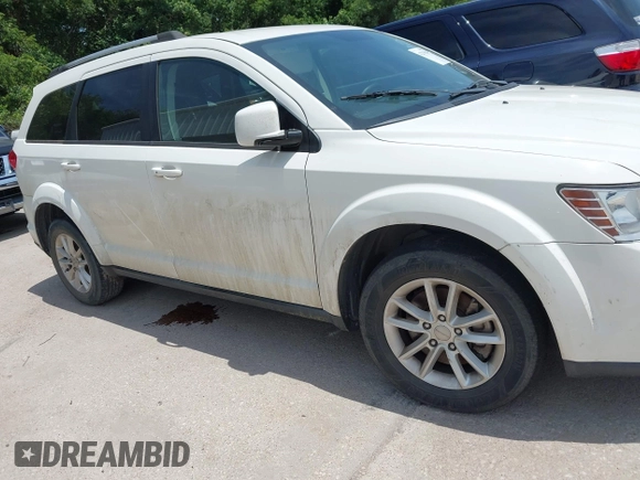 2017 Dodge Journey SXT z VIN 3C4PDCBG4HT590992, wystawiony jako IAAI lot #42378549 z przebiegiem 275 884 mil mil oraz . Historia ofert i sprzedaży dostępna na DreamBid. Obrazek 13.