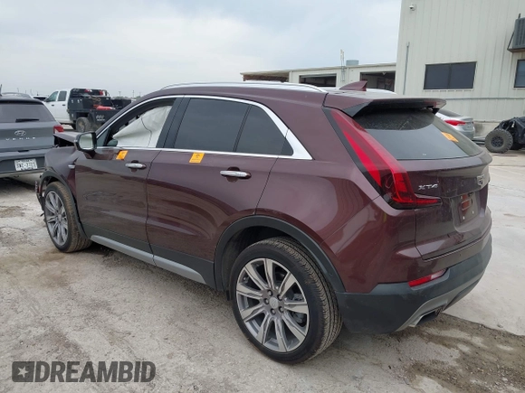 2022 Cadillac XT4 FWD Premium Luxury with VIN 1GYFZCR4XNF116845, listed as a IAAI auction lot 42128210 with 43,423 mi miles and . Bid and sale history available at DreamBid. Image 3.