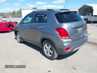 2020 Chevrolet Trax LT with VIN 3GNCJLSBXLL322296, listed as a IAAI auction lot 42030809 with 51,367 mi miles and . Bid and sale history available at DreamBid. Image 3.