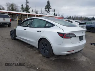 2021 Tesla Model 3 Long Range with VIN 5YJ3E1EB3MF856009, listed as a IAAI auction lot 41809767 with 42,072 mi miles. Bid and sale history available at carsss.com. Image 3.