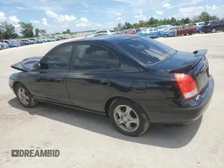 2003 Hyundai Elantra GLS with VIN KMHDN45D03U500898, listed as a Copart auction lot 61473825 with 127,252 mi miles and Salvage title. Bid and sale history available at DreamBid. Image 2.