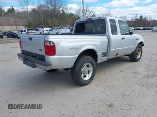 2001 Ford Ranger XL Fleet with VIN 1FTZR15E61TA83280, listed as a IAAI auction lot 42050223 with 216,957 mi miles. Bid and sale history available at carsss.com. Image 4.
