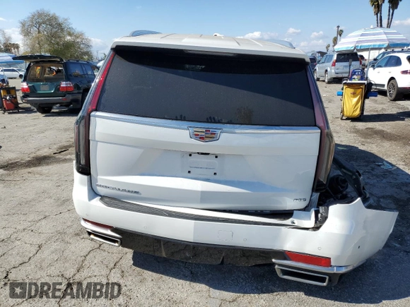 2021 Cadillac Escalade Premium Luxury z VIN 1GYS3CKL9MR471651, wystawiony jako Copart lot #44301275 z przebiegiem 24 328 mil mil oraz Szkoda całkowita • Salvage title. Historia ofert i sprzedaży dostępna na DreamBid. Obrazek 6.